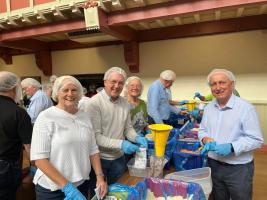 The Knutsford Team at their Workstation - equipped with hairnets!